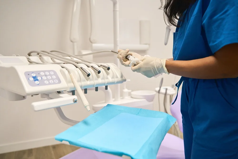 Clinician preparing instruments for a procedure